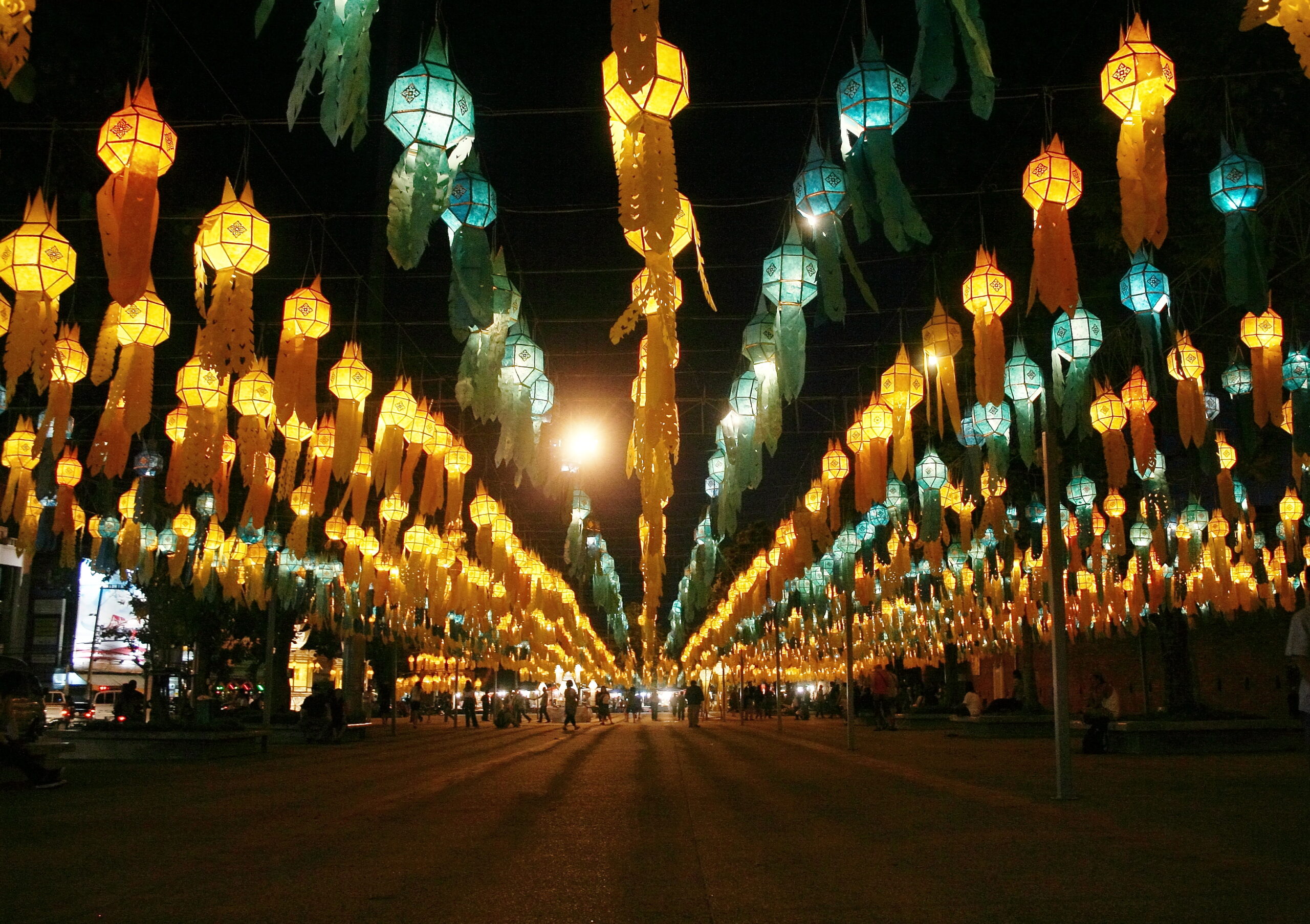 Colourful hanging lanterns decorating Tha Phae Gate during Yi Peng festival in Chiang Mai